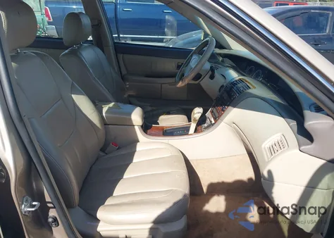 2001 Toyota Avalon Xls z USA, uszkodzony, nr VIN 4T1BF28B51U168750